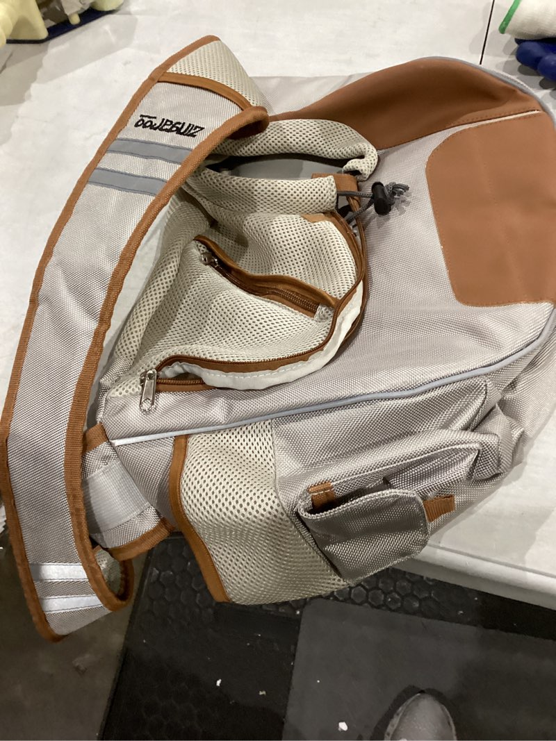 Condition photo showing As Is for hands-free sling pet carrier - for cats (up to 15lbs) and small dogs (up to 12lbs) – adjustable pouch for puppies & cats with safety hook, pockets, breathable mesh – travel tote for subway, walking beige