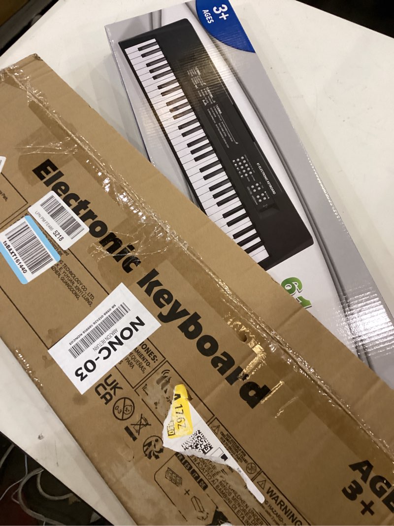 Condition photo showing New/Like New for 61 Keys Kids Piano Keyboard Toy with Mic – Portable Electronic Piano for 3 4 5 6 7 8 Girls Boys Beginners Birthday Xmas Gifts, Black