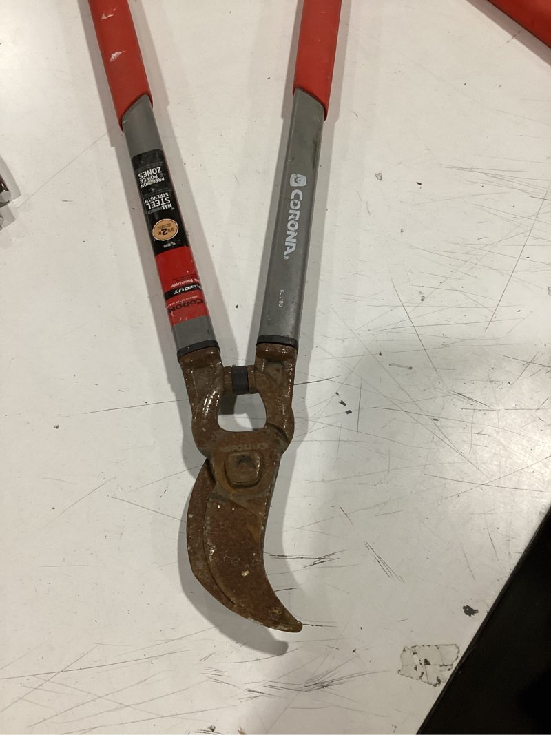 Condition photo showing As Is for corona dual cut 24.5 in. carbon steel hooked lopper