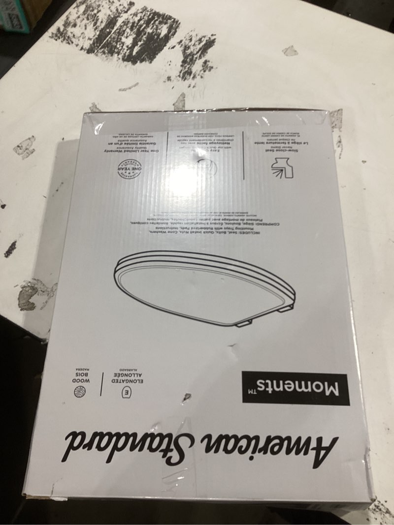 Condition photo showing Good Condition for American Standard Moments Wood White Elongated Soft Close Toilet Seat