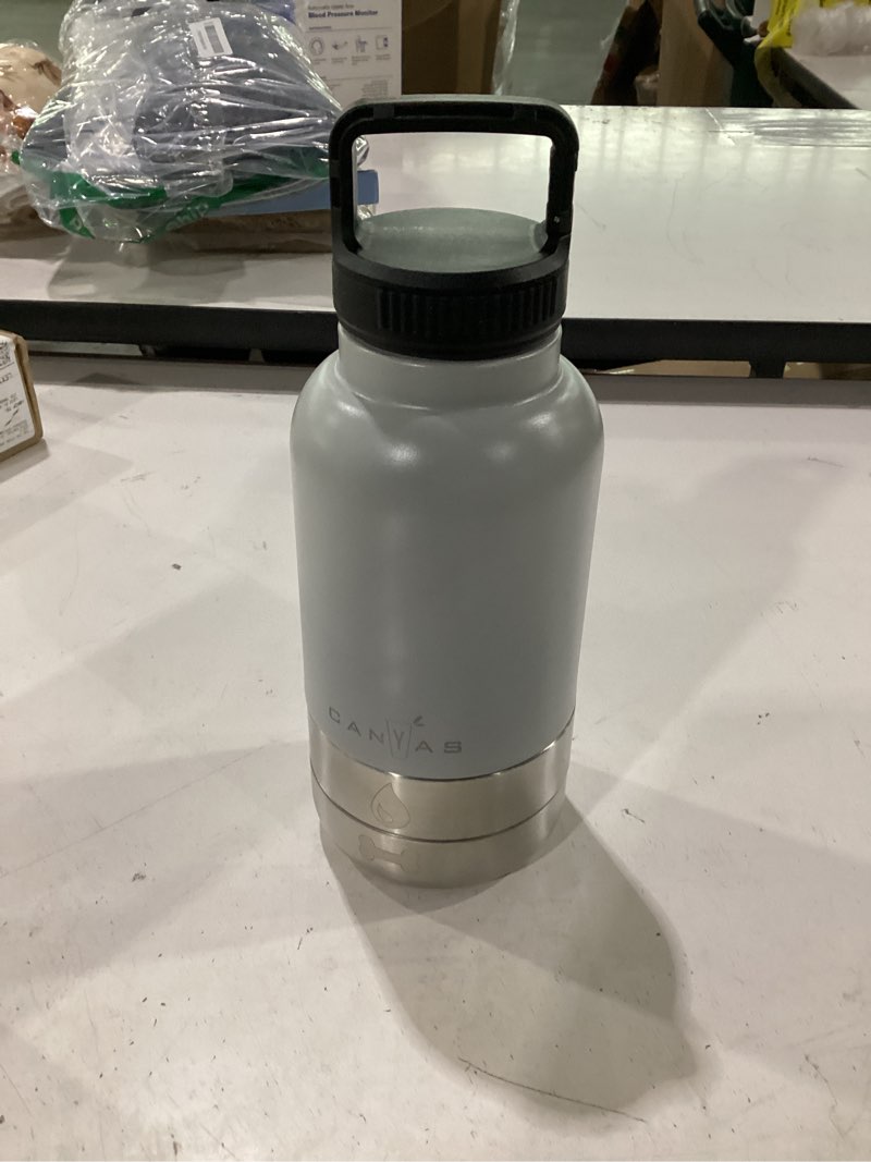 Condition photo showing Good Condition for 32oz insulated dog water bottle, leak proof with food & water bowls | eak-proof stainless steel bottle with detachable bpa-free food & water bowls; keeps water cold 24h for hiking, walks, travel storm gray