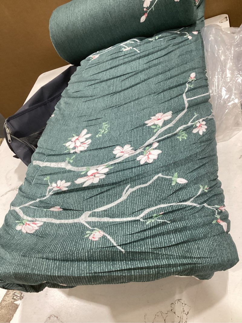 Condition photo showing New/Like New for peachleaf dark green and white, pink, deer-print microfiber comforter set