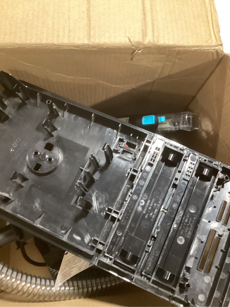 Condition photo showing New/Like New for Shark StainStriker Portable Carpet & Upholstery Cleaner w/on board self cleaning - Spot, Stain, & Odor Eliminator, Includes 2 Cleaning Tools & 2 Cleaning Solutions, Charcoal, PX221BRN StainStriker w/ Onboard Self-Cleaning