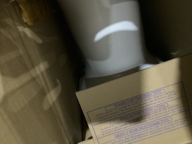 Condition photo showing New/Like New for TOTO Drake Elongated Universal Height TORNADO FLUSH Toilet Bowl with 10 Inch Rough-In and CEFIONTECT, WASHLET+ Ready, Cotton White - C776CEFGT40.10#01