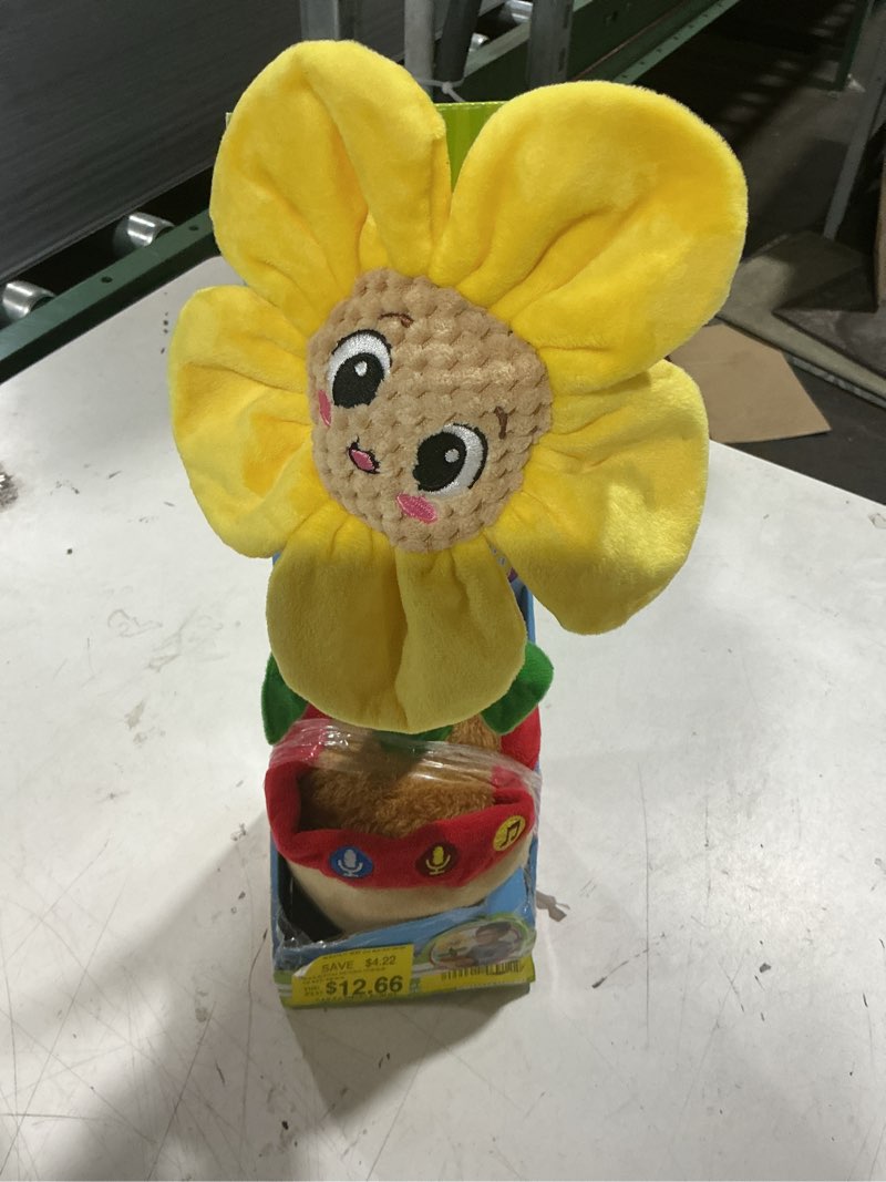 Condition photo showing As Is for spark create imagine learning bilingual talking and dancing plush sunflower, 14 inch, light features, repeats what you say