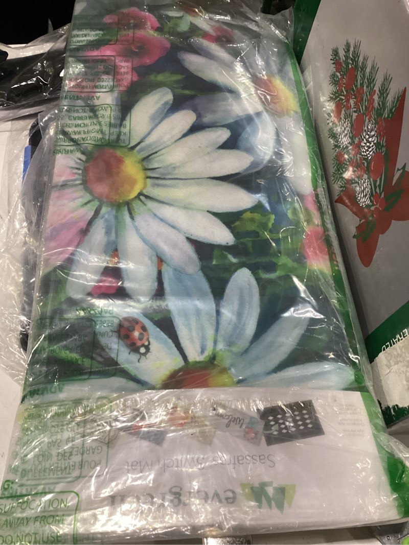Condition photo showing New/Like New for evergreen sassafras big daisies interchangeable entrance doormat | indoor and outdoor | 22-inches x 10-inches | non-slip backing | all-season | low profile | home décor