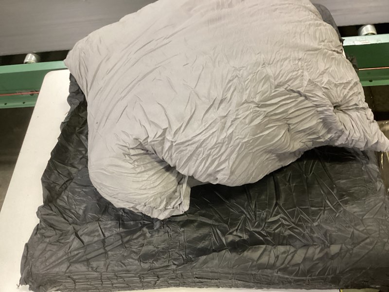 Black cushion with gray pillow
