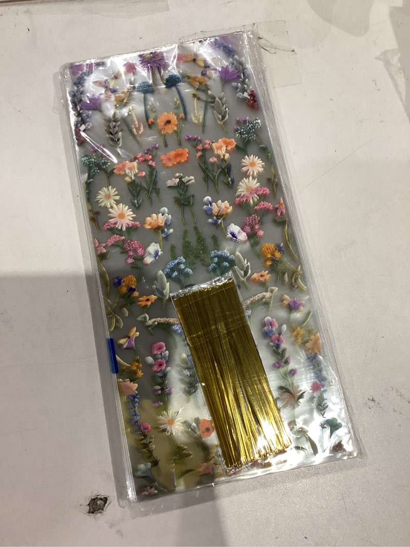 Condition photo showing New/Like New for ARPOVIST 150Pcs Wildflower Cellophane Treat Bags Floral Candy Bags for Party Favors, Baby Shower, Bridal Shower, Birthday, Wedding, Clear Plastic Goody Bag for Sweets and Snacks11x 5 inches