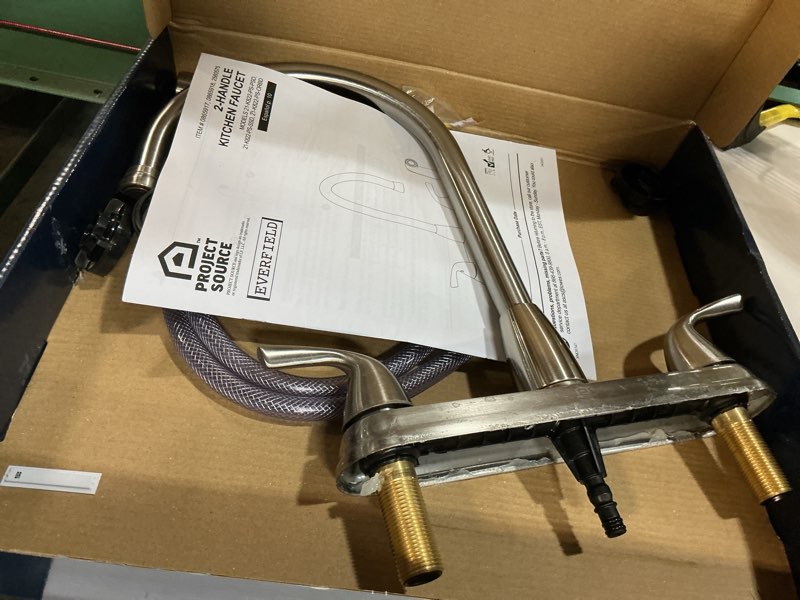 Condition photo showing As Is for project source everfield stainless steel double handle kitchen faucet (deck plate and side spray included)