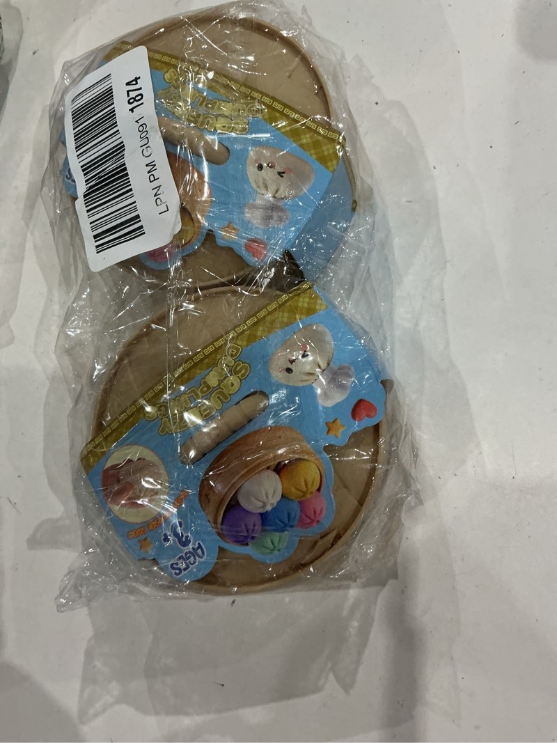 Condition photo showing Good Condition for glitter dumpling squishy mystery box - smile white and gold 2026 upgraded dumplings squishes for adults teens squeeze easter basket stuffers & stocking stuff - 2 pcs