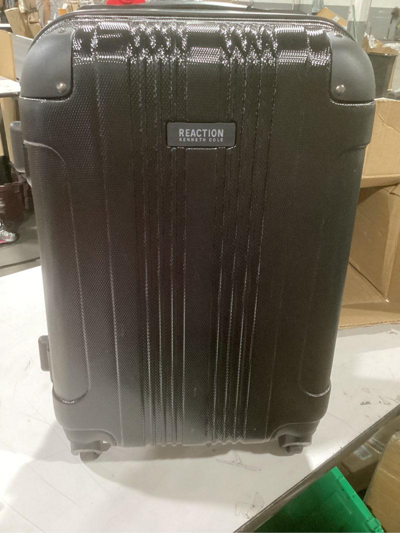 Condition photo showing Good Condition for Kenneth Cole REACTION Out of Bounds Lightweight Hardshell 4-Wheel Spinner Luggage, Midnight Black, 20-Inch Carry On 20-Inch Carry On Midnight Black