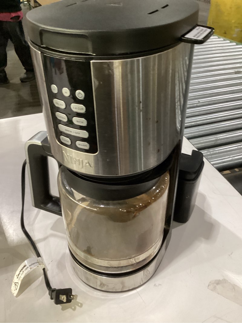 Condition photo showing As Is for Used missing water tank Ninja 14 Cup , Programmable Coffee Maker XL Pro with Permanent Filter, 2 Brew Styles Classic & Rich, 4 Programs Small Batch, Delay Brew, Freshness Timer & Keep Warm, Stainless Steel, DCM201