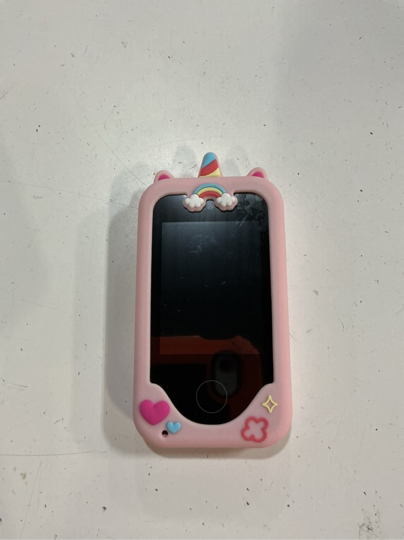 Condition photo showing New/Like New for kids smart phone with dual camera, game & music player, toddler learning play toy cell phone, gifts for girls, christmas, birthday, age 3-10, light pink