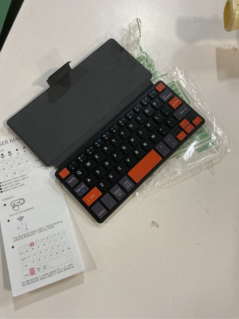 Condition photo showing Good Condition for Doohoeek Universal Bluetooth Mini Keyboard, Wireless Compact Keyboard with Orange Navigation Keys & Any-Angle Stand for Android/iOS/Windows, Dual-Device Keypad for Phones/Galaxy Z Fold/iPad mini