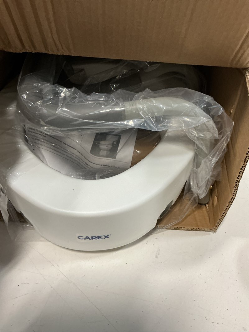 Condition photo showing Good Condition for carex 3.5 inch raised toilet seat with arms, elongated toilet seat riser, up to 250 lbs capacity, elevating & raising seat for elderly & handicap, universal, slip-resistant with padded handles, white