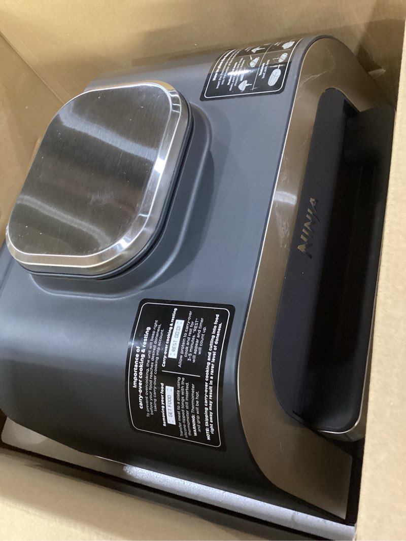Condition photo showing As Is for Ninja DG551 Foodi Smart XL 6-in-1 Indoor Grill with Air Fry, Roast, Bake, Broil, & Dehydrate, Foodi Smart Thermometer, 2nd Generation, Black/Silver 6-in-1 With Thermometer