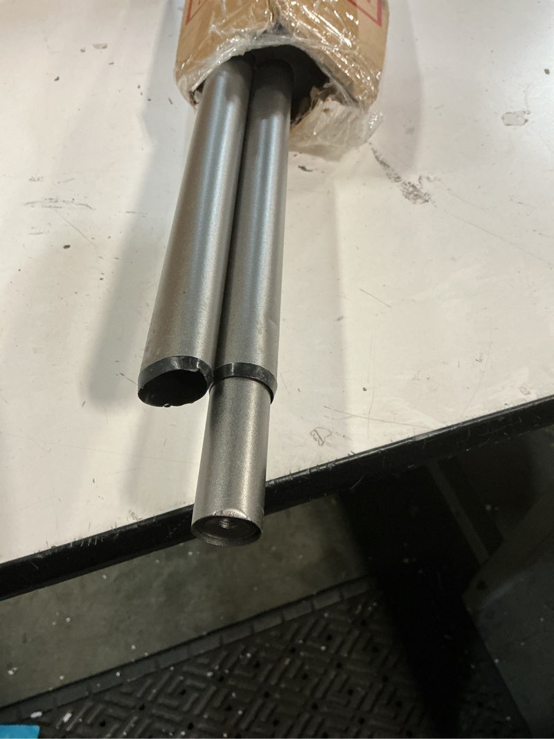 Condition photo showing As Is for exclusive home vine 1" curtain rod and finial set, gunmetal, adjustable 66"-120" gunmetal 66-120