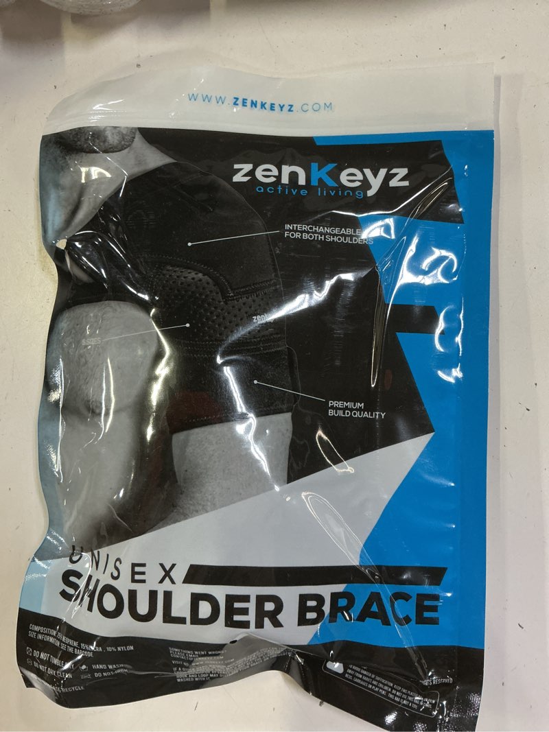 Condition photo showing New/Like New for zenkeyz shoulder brace for men & women - size xs/s (chest 24-30") - black neoprene compression sleeve with adjustable strap - stability support for rotator cuff area & joint - integrated ice/heat pocket - supportive fit for smaller frames xs black