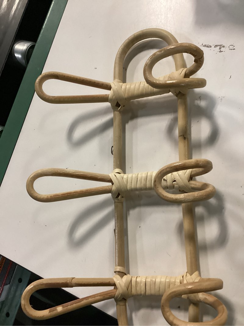 Condition photo showing As Is for natural rattan wall hook rack features a three-branch design for clothing storage
