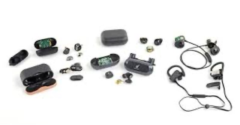 Assortment of loose electronics, headphones, etc.