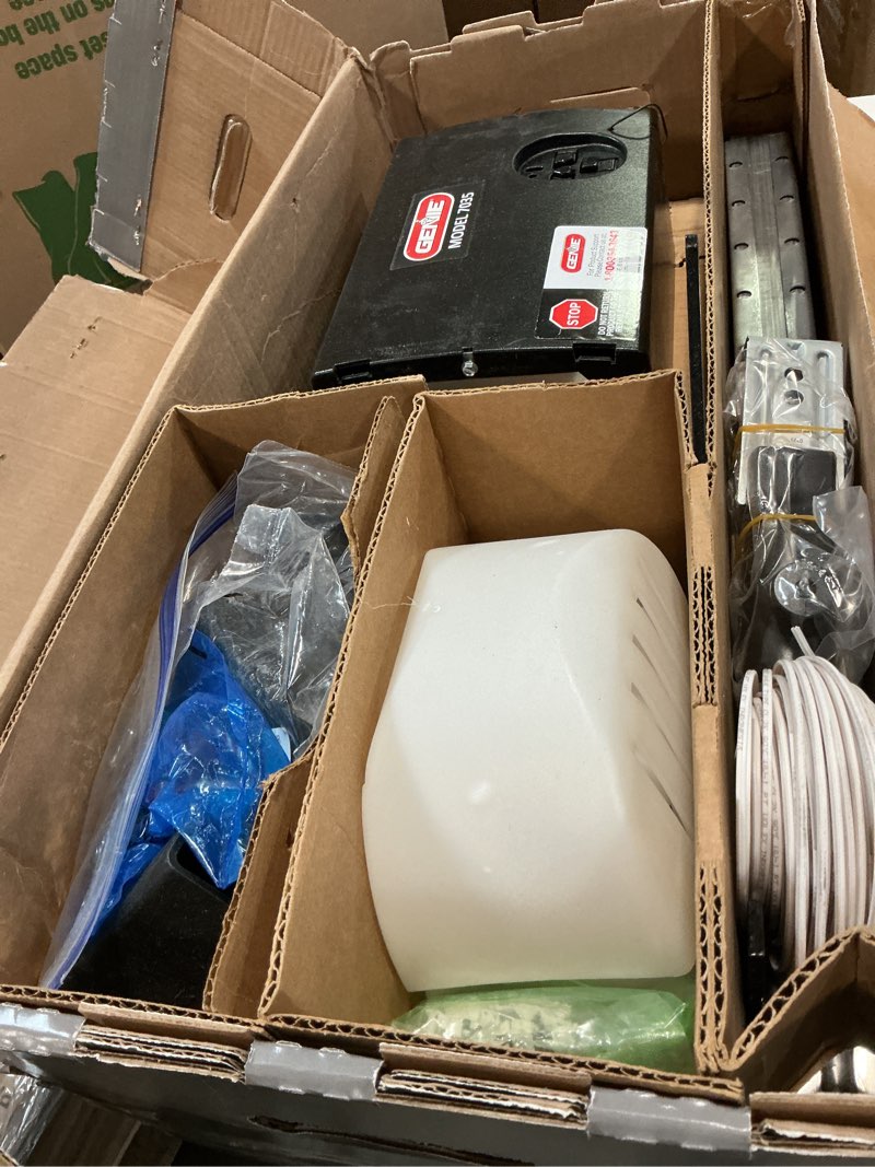 Condition photo showing Good Condition for Genie Chain Drive 750 3/4 HPc Garage Door Opener w/Battery Backup - Heavy Duty - Operate your garage door when the primary power is out - Wireless Keypad Included, Model 7035-TKV,BLACK Two remotes & Keypad