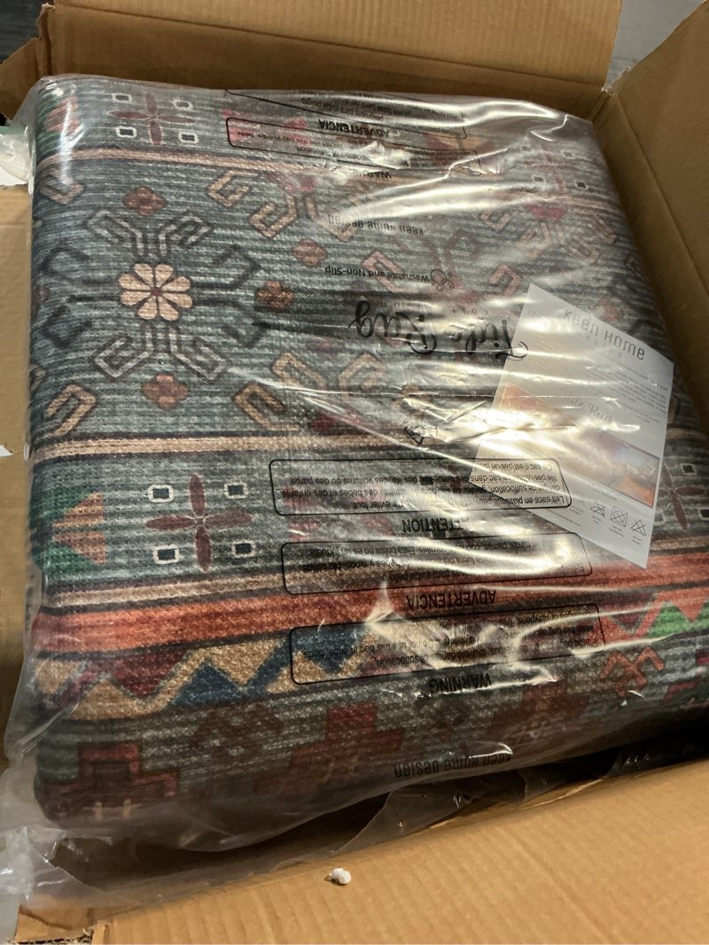 Condition photo showing Good Condition for keen home design vintage washable area rug, non-slip low pile, 9x12 | machine washable cotton chenille, 0.25in low pile, rubber non-slip back; living room, bedroom, dining room 9' x 12' (rectangular) grey/multi