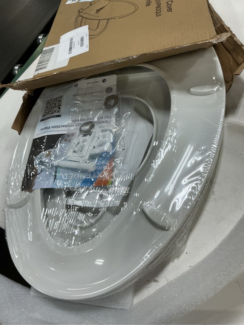 Condition photo showing New/Like New for toilet seat, elongated toilet seat with toddler seat built in, potty training toilet seat elongated fits both adult and child, with slow close and magnets- elongated