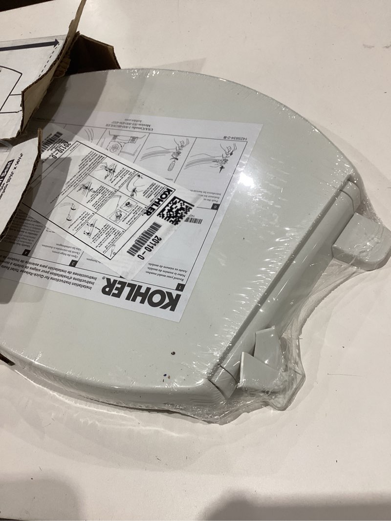 Condition photo showing As Is for item broken ))))))))kohler 20110-0 brevia, slow close toilet seat, elongated toilet seat, grip-tight bumpers quick-attach hardware, white white elongated quiet-close