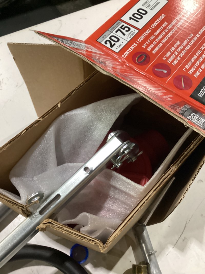 Condition photo showing As Is for fill-rite fr152 piston hand pump with hose & nozzle spout, red piston pump w/accessories