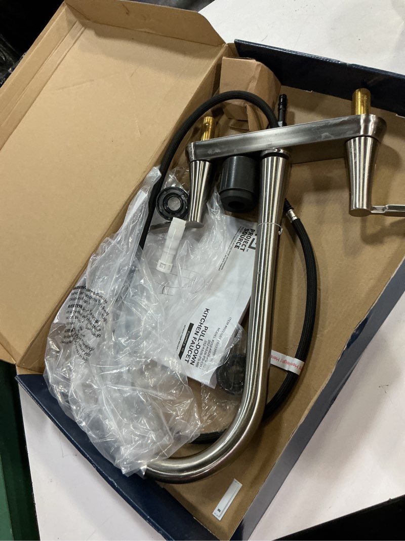 Condition photo showing As Is for project source stainless steel double handle deck-mount pull-out kitchen faucet with sprayer