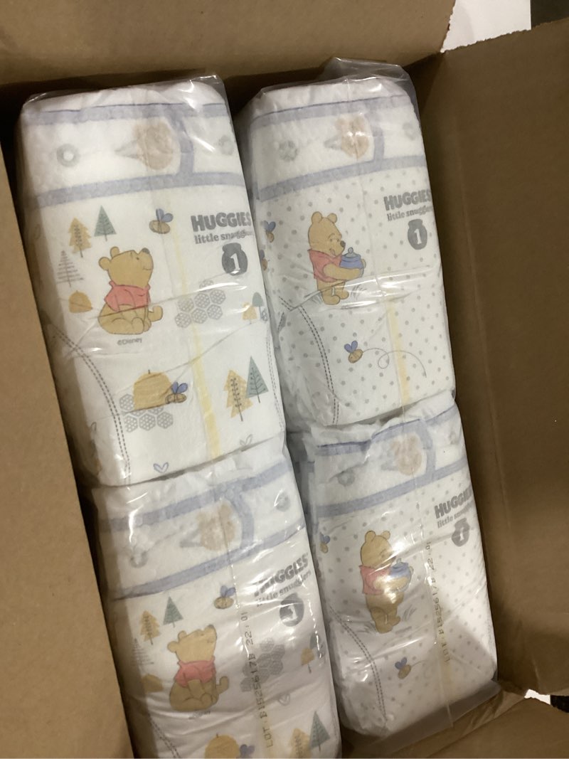 Condition photo showing New/Like New for Huggies Size 1 Diapers, Little Snugglers Baby Diapers, Size 1 (8-14 lbs), 96 Count, Packaging May Vary Size 1 96