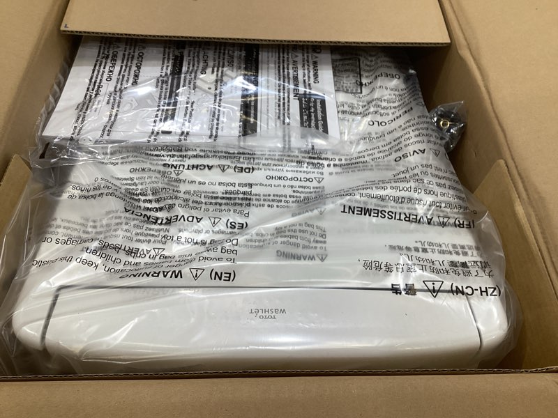 Condition photo showing As Is for toto washlet s5 electronic bidet toilet seat with instantaneous water heating, premist and ewater+ wand cleaning, elongated, cotton white - sw3446#01 cotton white elongated contemporary lid