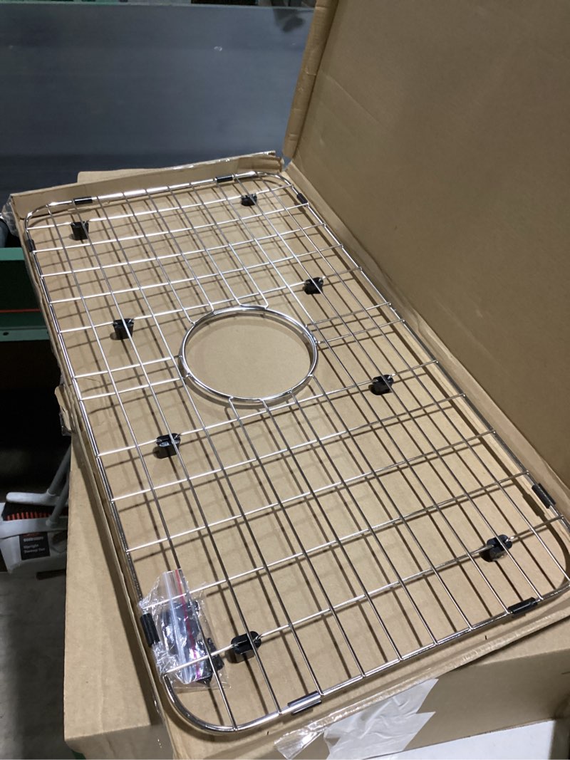 Condition photo showing Good Condition for sink bottom grid 24-1/8" x 12-5/8", centered drain with corner radius 1-1/2", sink protector with rear drain for single sink bowl (24.1"w x 12.6"d x 1"h) 24-1/8" x 12-5/8" centered drain