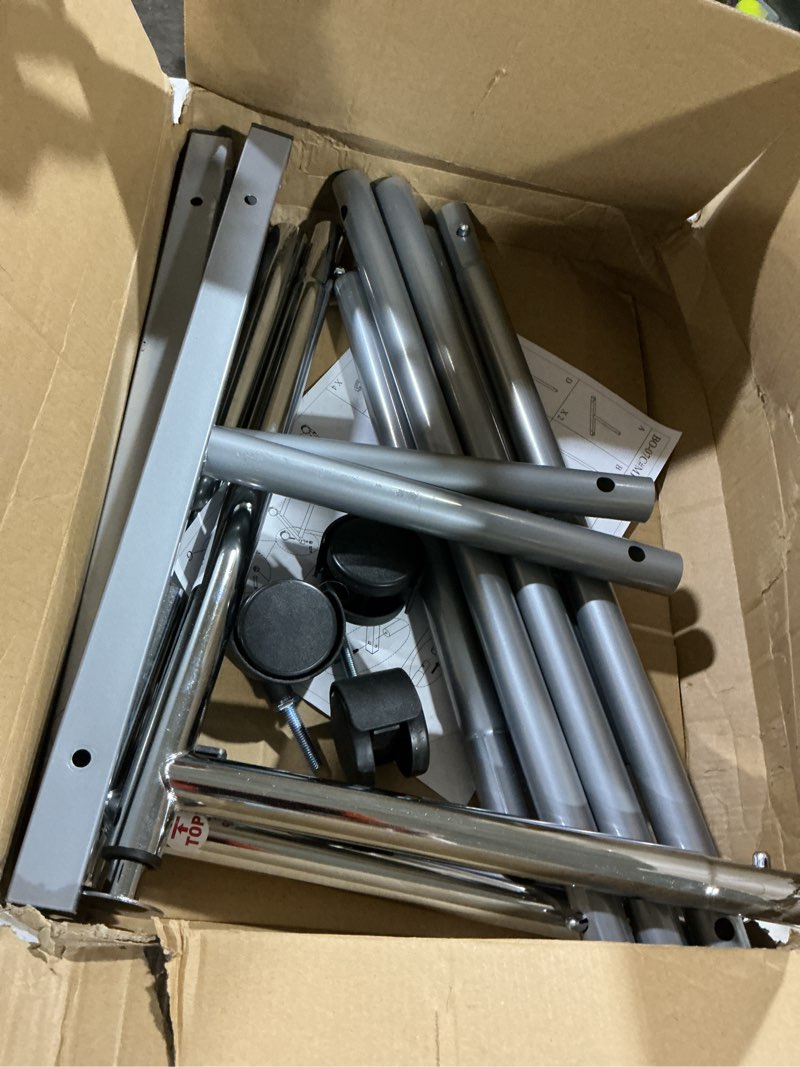 Condition photo showing As Is for simple houseware standard rod garment rack, silver