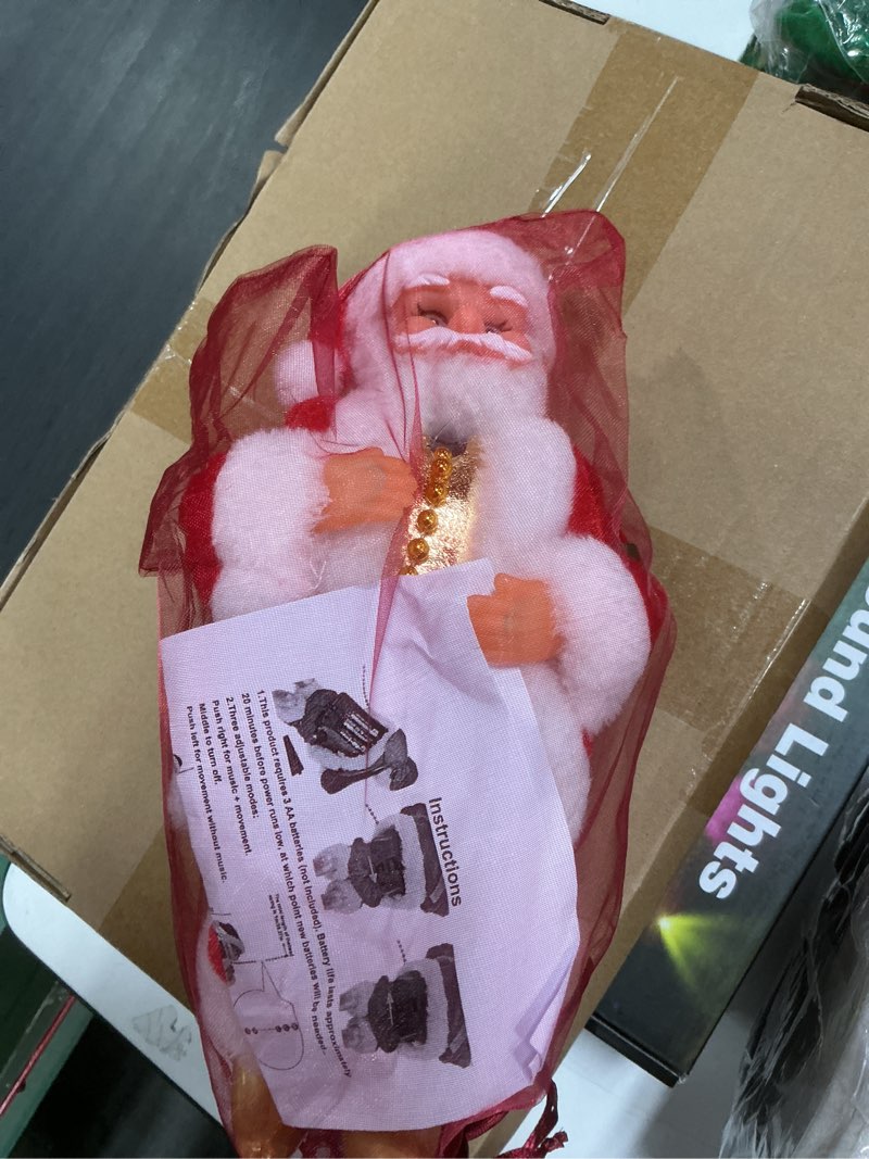 Condition photo showing New/Like New for Climbing Santa Claus 9" Christmas Ornament Xmas Decoration Climbs Up and Down Battery Operated Toy with Light Music and Sound Animated Climbing on Beads Musical Moving Figure Xmas Christmas Ornament