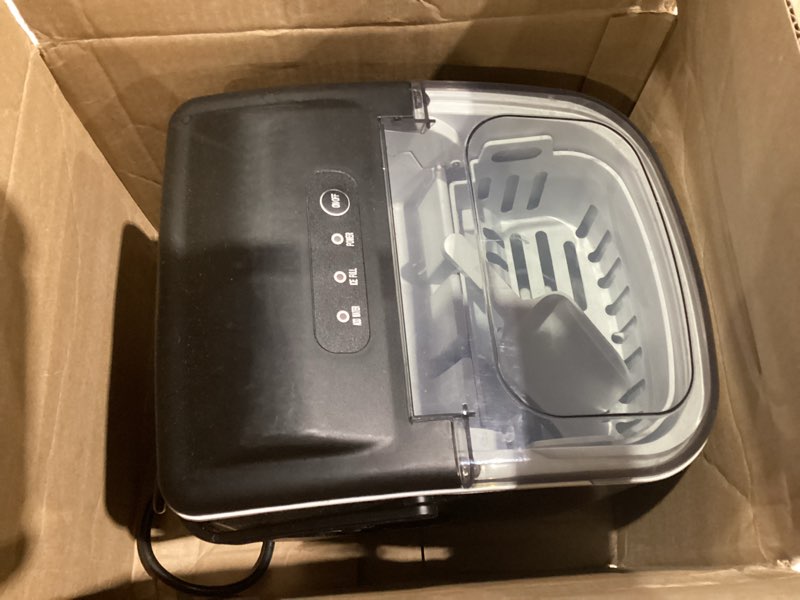 Condition photo showing As Is for EUHOMY Countertop Ice Maker Machine with Handle, 26lbs in 24Hrs, 9 Ice Cubes Ready in 6 Mins, Auto-Cleaning Portable Ice Maker with Basket and Scoop, for Home/Kitchen/Camping/RV. (Black) Black 26lbs