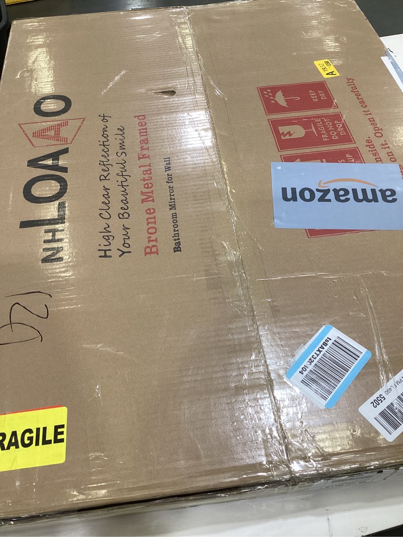 Condition photo showing As Is for loaao 22”x30” bronze bathroom mirrors for vanity, rounded rectangle brushed bronze metal frame mirror, anti-rust, hangs horizontally or vertically bronze 22"l x 30"w