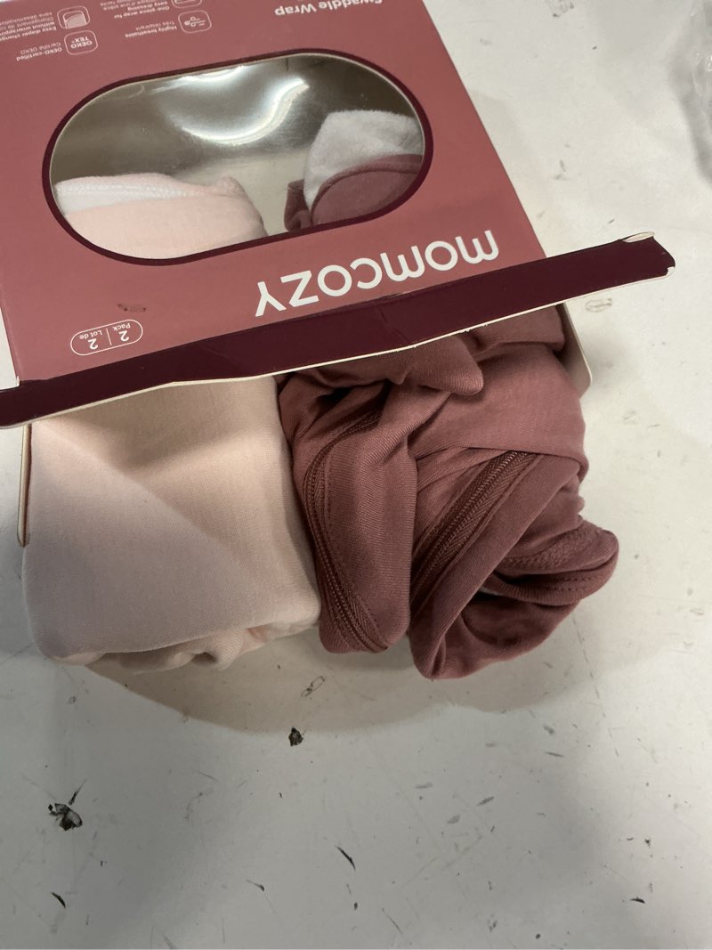 Condition photo showing Good Condition for Momcozy Swaddles for Newborns, Quiet Fastner Suitable for Infant 0-3 Months, New-Parent-Friendly Swaddle Sack, Reduce Startle Reflex, Newborn Boys Girls Registry Essentials, 2-Pack, Bloom Bloom One Size (0-3 Months)
