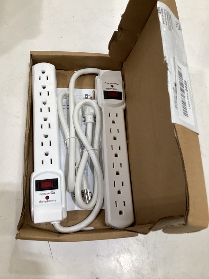 Condition photo showing Good Condition for amazon basics surge protector power strip, 6-outlet with 200j protection, circuit breaker, led indicator, on/off switch, wall-mounting, 2ft extension cord, white, 2-pack 200 joule white 2 pack