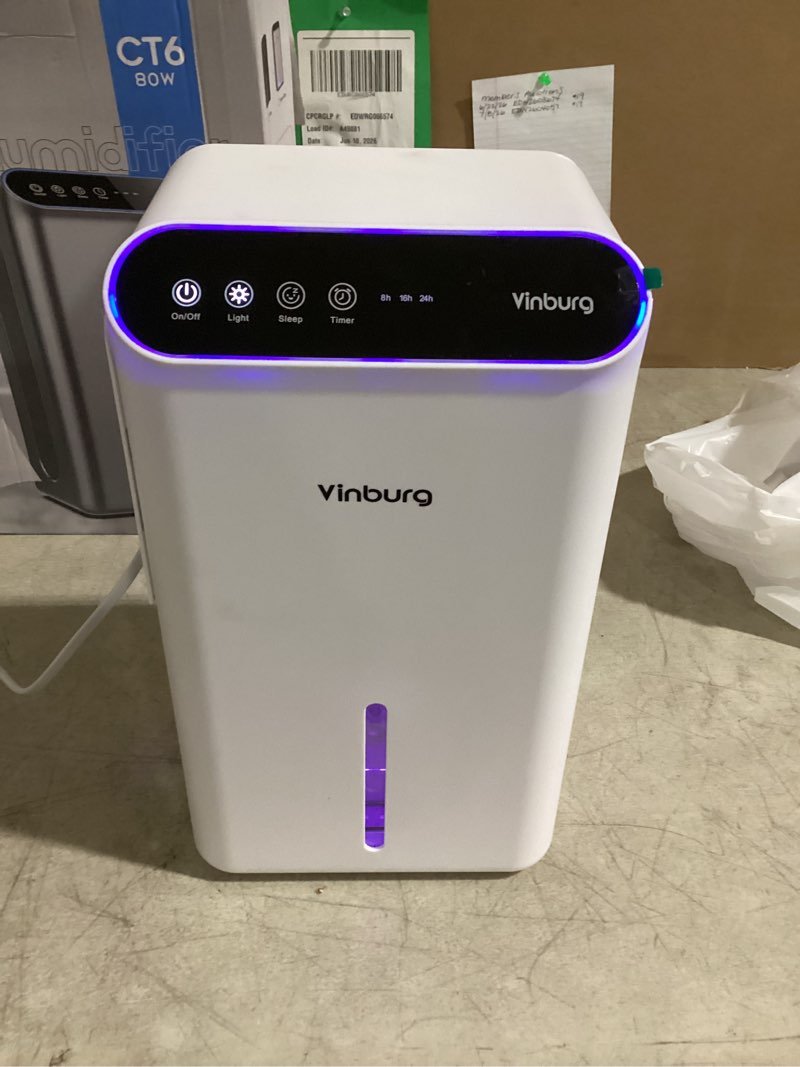 Condition photo showing New/Like New for dehumidifier for home up to 1000 sq.ft, 98oz small quiet dehumidifier with drain hose, 3 timer modes, auto shut off, aromatherapy & 7 color light for bedroom, bathroom, basement (sliver white)