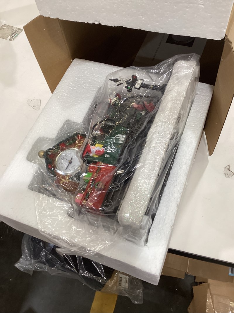 Condition photo showing New/Like New for VCUTEKA Animated Christmas Village Houses, Lighted Musical Christmas Village Train Station with Santa, Victorian Xmas Village Collectible Building for Holiday Table Display or Home Décor Black