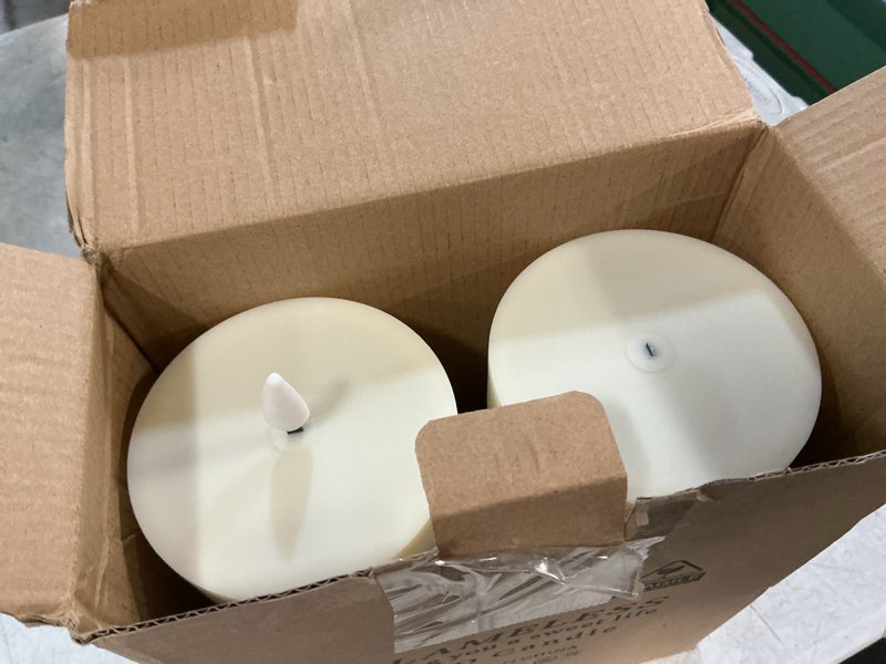 Condition photo showing As Is for 10" x 4" large outdoor waterproof flickering flameless candles with timer,2pcs battery operated led pillar candles with embedded star string for outdoor lanterns,porch,patio decor(ivory) 2pcs-d4"xh10" ivory