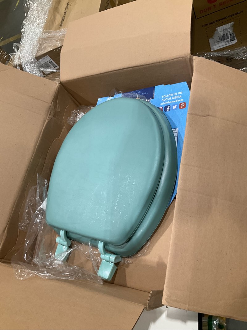 Condition photo showing Good Condition for soft standard vinyl toilet seat, light green - 17 inch soft vinyl cover with comfort foam cushioning - fits all standard size fixtures - easy to install fantasia by achim home decor light green 17 inch vinyl