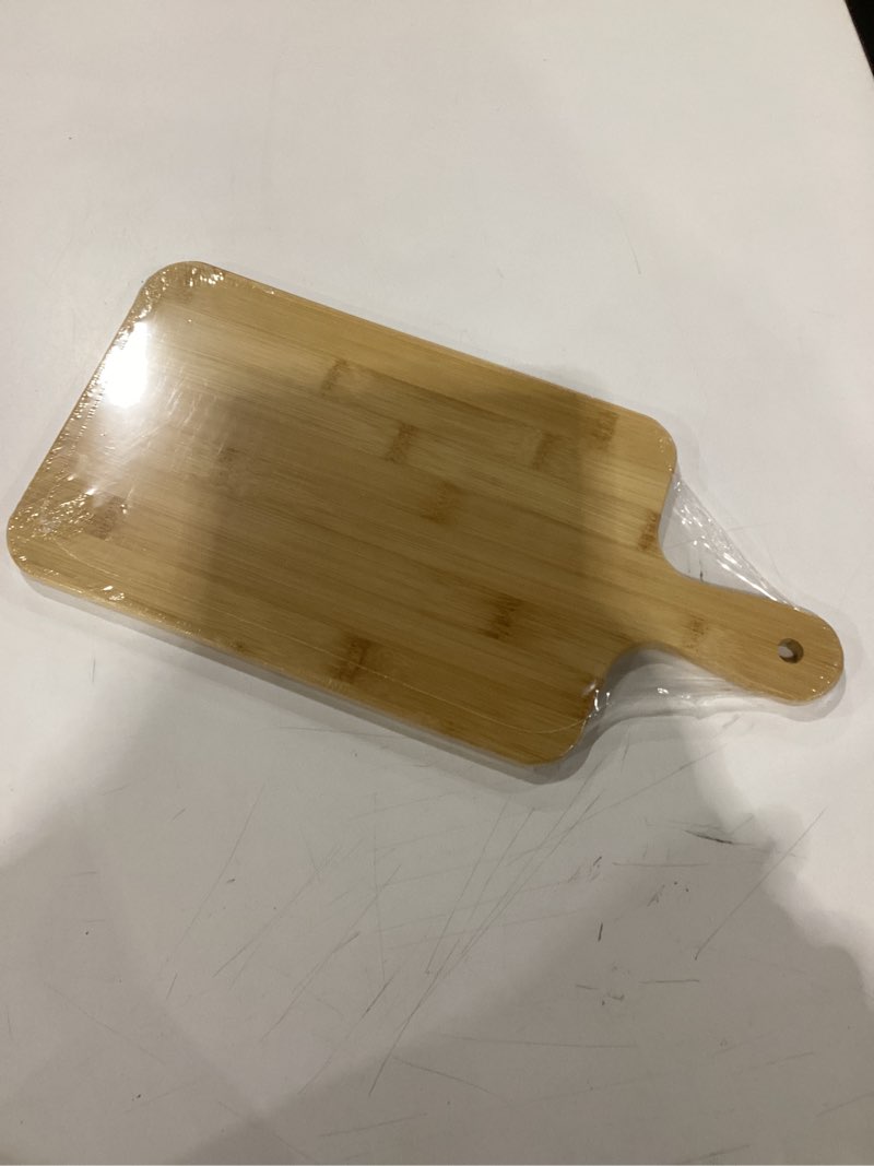 Condition photo showing New/Like New for Bamboo cutting board