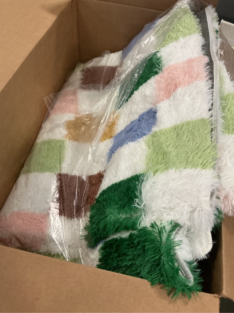 Condition photo showing Good Condition for Retro shag area rug in a multi-color block pattern (unknown size)