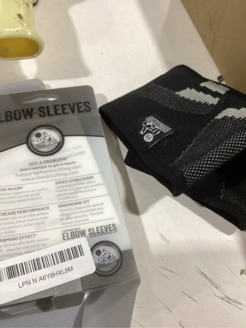 Condition photo showing Good Condition for Nordic Lifting Elbow Compression Sleeves (1 Pair) for Men & Women - Support for Pain Relief, Tendonitis, Golfer’s & Tennis Elbow - Weightlifting Brace for Workout, Arm & Joint Recovery Large Grey
