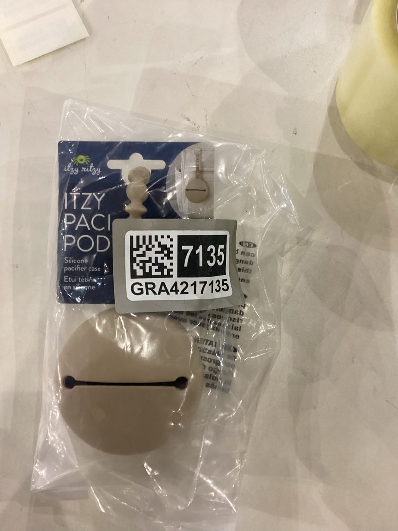 Condition photo showing New/Like New for Itzy Ritzy Silicone Pacifier Holder – Holds 2 Pacifiers – Soft BPA-Free Silicone with Secure Loop Strap – Easy to Attach to Diaper Bags, Strollers & More (Toast)