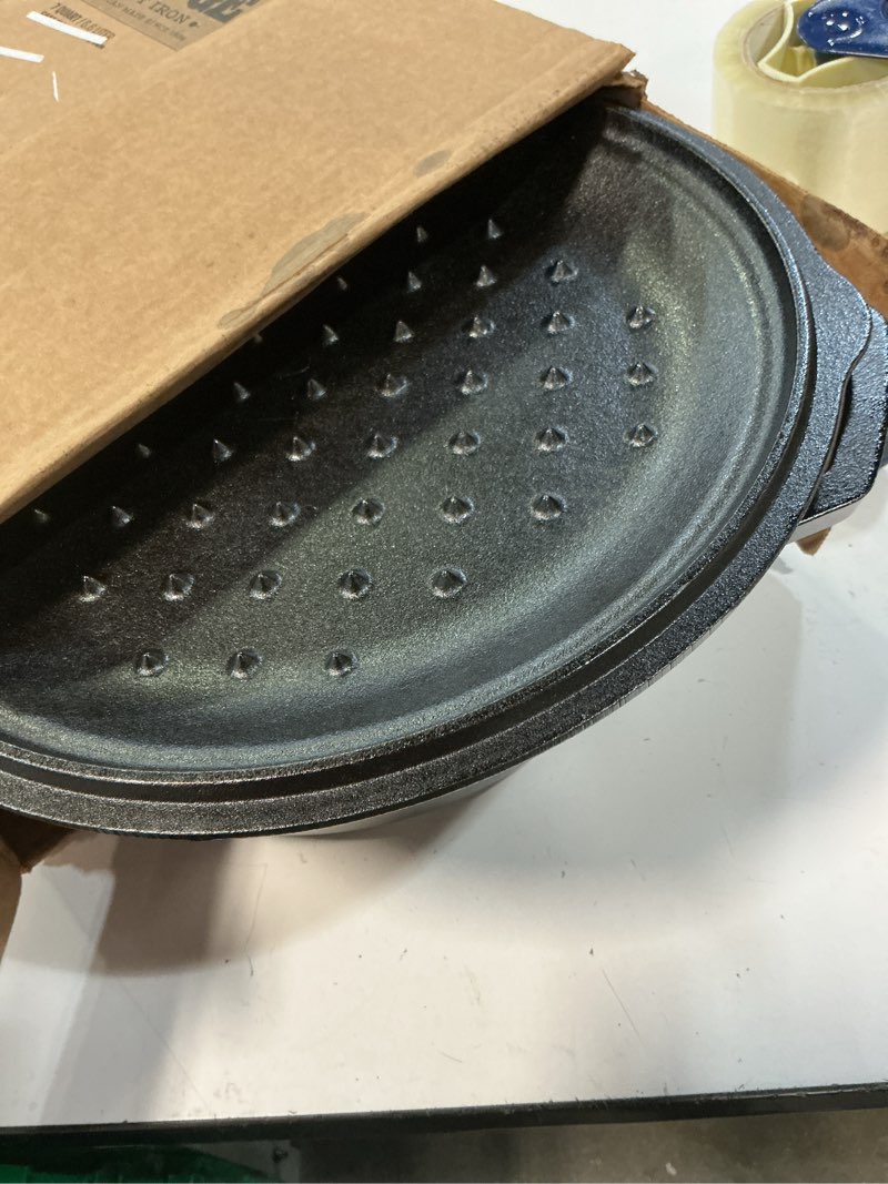 Condition photo showing As Is for lodge 7-quart cast iron dutch oven – made in usa, pre-seasoned, pfas-free & non-toxic, heat-treated, induction compatible, self-basting lid, durable multi-use cooking pot for oven to table 7 quart dutch oven