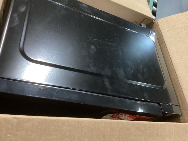 Condition photo showing As Is for frigidaire emw733blackamz 0.7 cu. ft. microwave, black