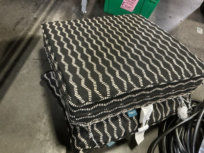 Condition photo showing As Is for  origin 21 25-in x 25-in 2 -piece black helix jacquard deep seat patio chair cushion